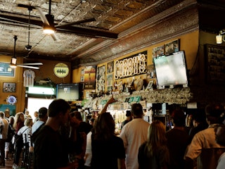 Lively crowd inside Corby’s Irish Pub, one of South Bend’s best-known gathering spots.
