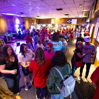 Group of people standing and sitting, celebrating Dyngus Day