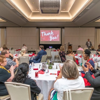 A business meeting taking place at the Gillespie Conference Center