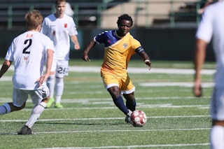 The South Bend Lions soccer team playing on School Field in South Bend