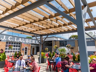 Customers enjoy outdoor seating at The Lauber in downtown South Bend