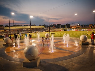 Cool off at the Splash Pad at Four Winds Field and watch the South Bend Cubs.