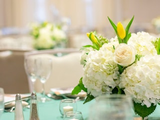 A close up photo of a flower arrangement at the Gillespie Conference Center