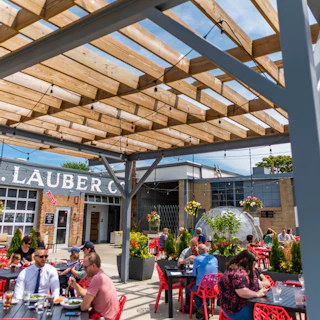 Customers enjoy outdoor seating at The Lauber in downtown South Bend