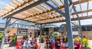 Customers enjoy outdoor seating at The Lauber in downtown South Bend