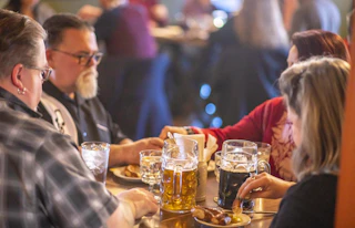 Beer steins and German food at Weiss Gasthaus restaurant